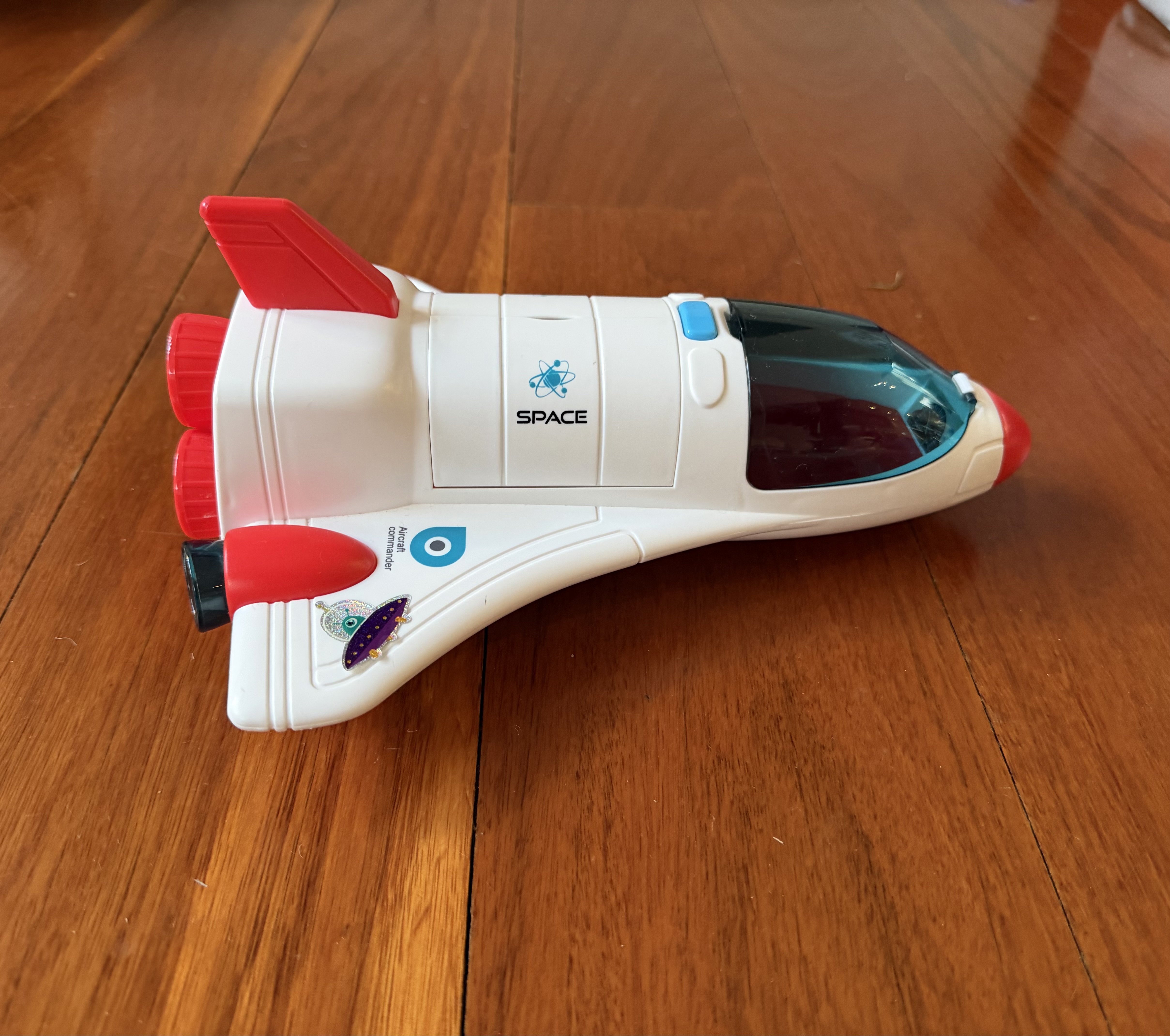 Before: Toy space shuttle side view